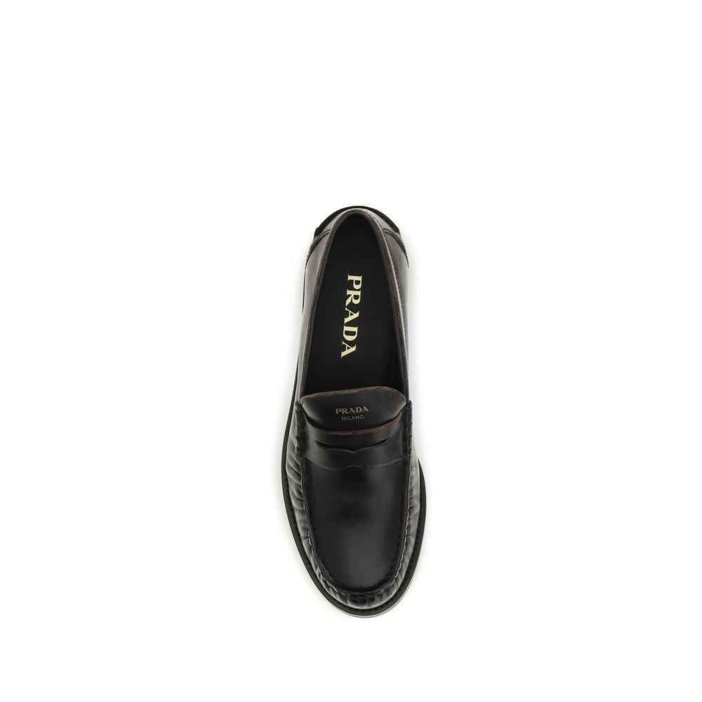 Loafers slip-on Prada negri din piele