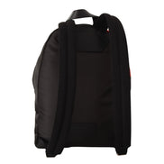 Back view of black designer backpack with padded shoulder straps on white background
