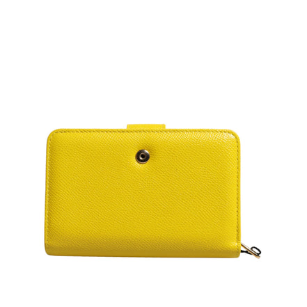 Portofel continental clutch bifold din piele galbenă Dolce & Gabbana