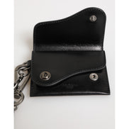 Portofel Dolce & Gabbana din piele neagră Cavallo cu lanț și închidere prin capse, bifold, cu suport pentru carduri