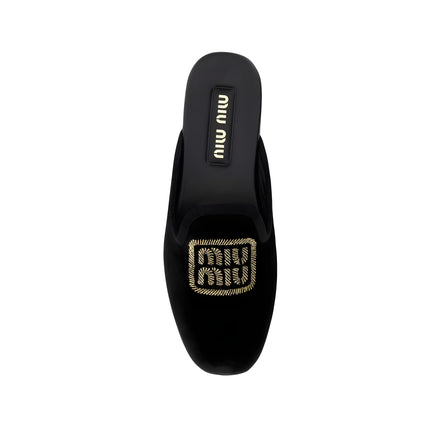 Mules negre Miu Miu
