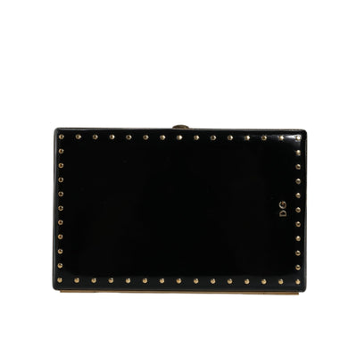 Poșetă de seară tip clutch Dolce & Gabbana din piele neagră cu ținte și ramă aurie