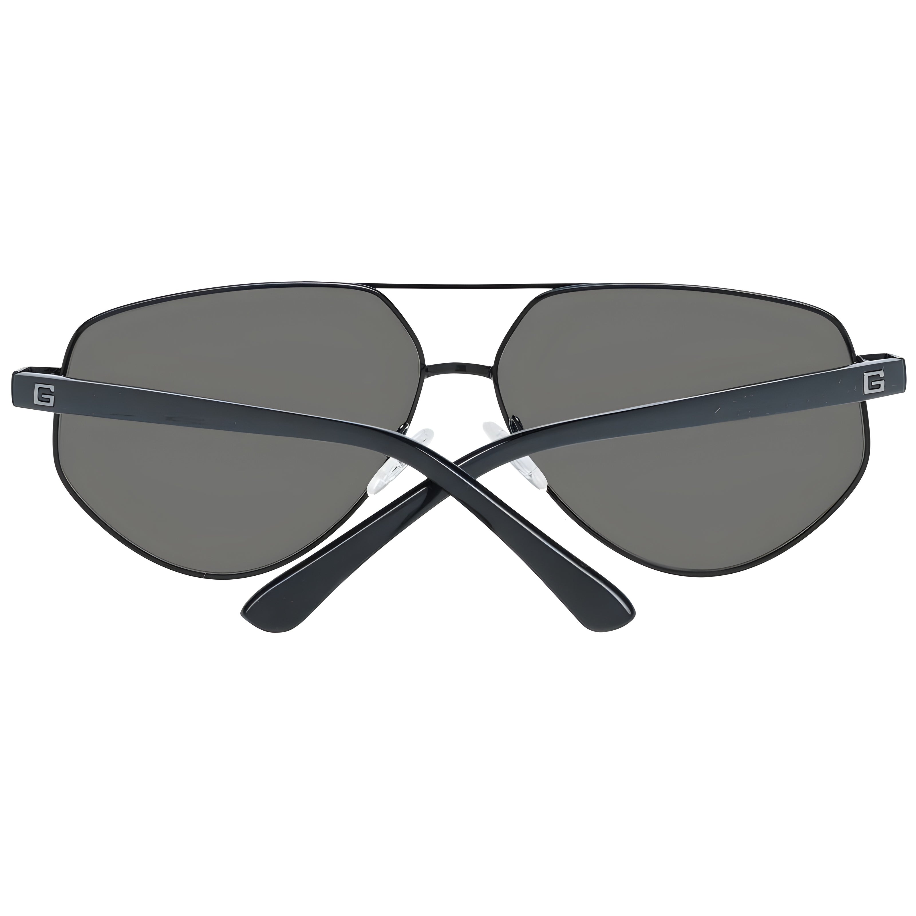 Black aviator sunglasses with dark lenses, metal frame, and G logo on arms
