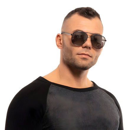 Man wearing stylish aviator sunglasses and a casual two-tone sweater on white background