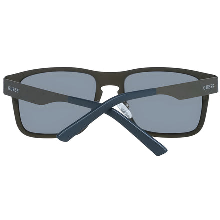Black rectangular Guess sunglasses with dark lenses, folded arms, front view.