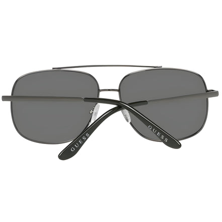 Black rectangular sunglasses with dark lenses and silver GUESS logo on temples