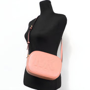 Geantă crossbody Michael Kors Jet Set Travel Medium Sherbert Leather Oval Camera