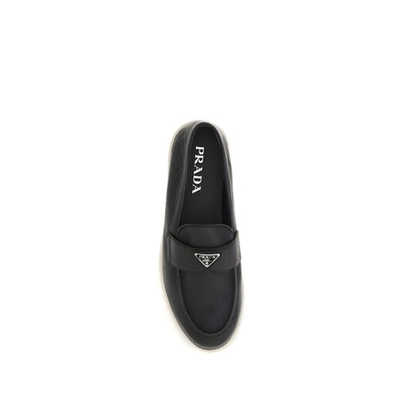 Mocasini slip-on Prada negri din piele întoarsă
