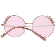 Round pink sunglasses with scalloped metal rims and rose gold frames, viewed from behind.