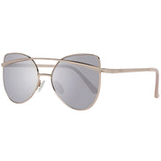 Cat eye sunglasses with gold metal frame and grey tinted lenses, modern designer style