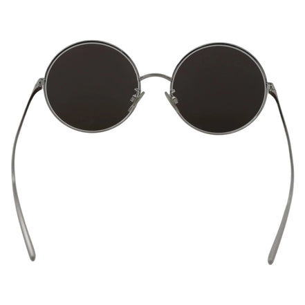 Round black lens sunglasses with thin silver metal frame on white background