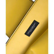 Geantă clutch/crossbody Dolce & Gabbana din piele galbenă netedă, cu logo DG